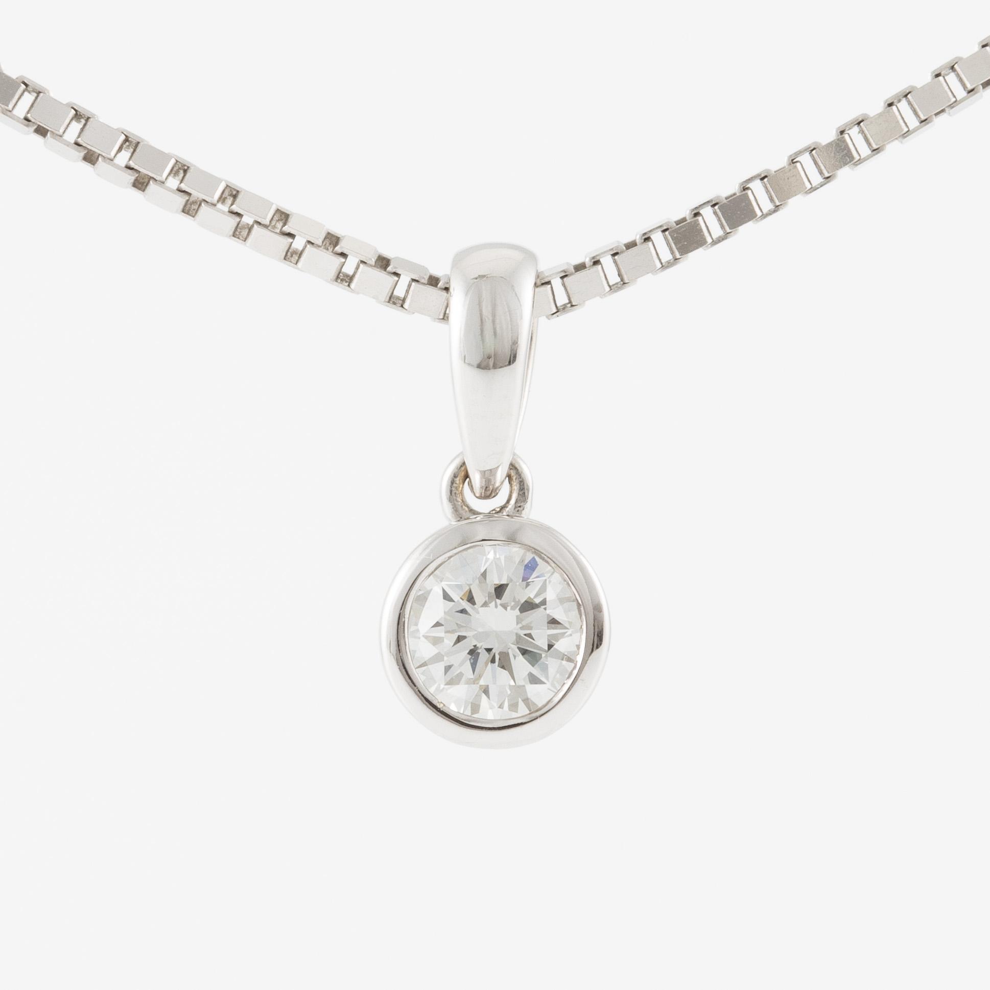 Collier 18K vitguld med briljantslipad diamant 0.40 ct.