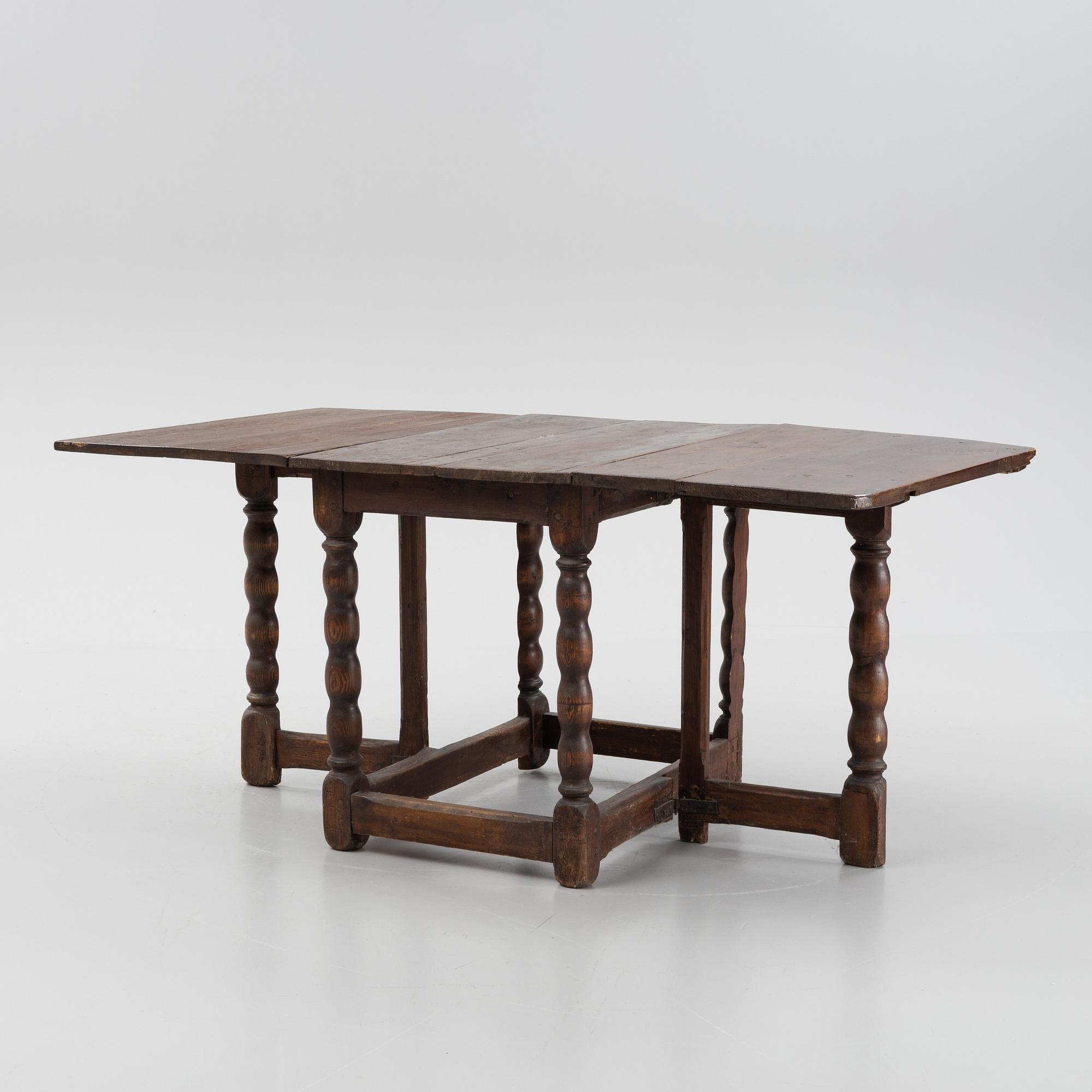 A baroque gate-leg table, 18th century.