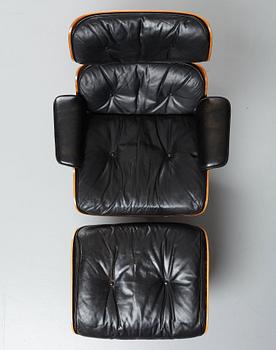 Charles & Ray Eames, a 'Lounge chair' and ottoman, Vitra 1960-1970s.