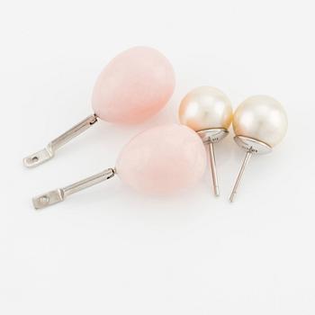 A pair of 18K white gold Gaudy earrings with cultured South Sea pearls and pink coral drops.