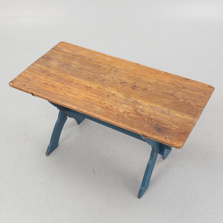 A trestle table, 19th Century.