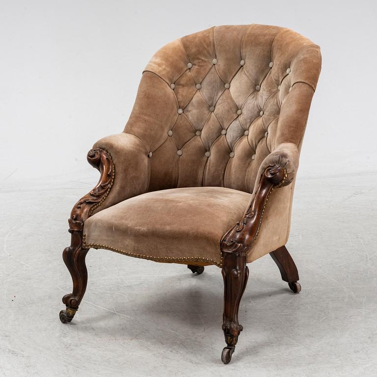 A rococo style easy chair, 19th Century.