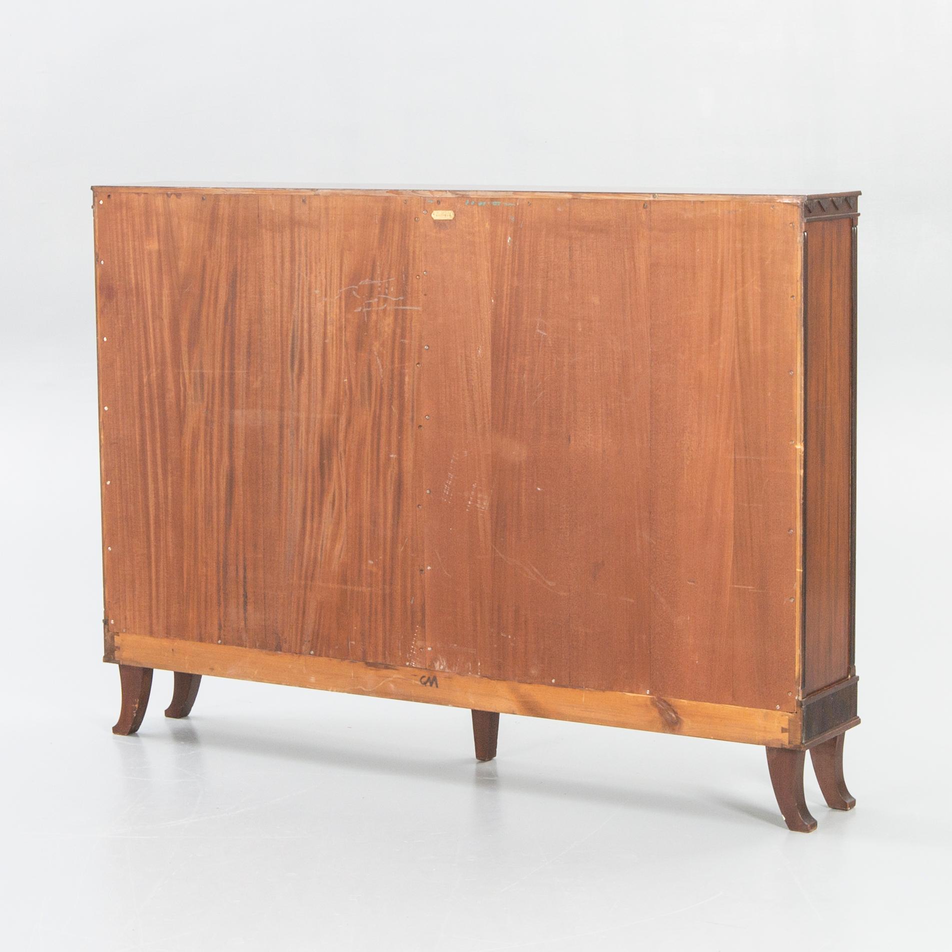 Carl Malmsten, an NK (Nordiska Kompaniet) 1924 birch and mahogany  book case.