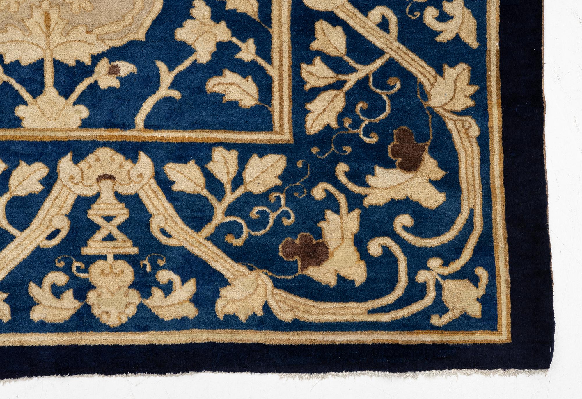 An antique Peking carpet, north China, c. 438 x 373 cm.