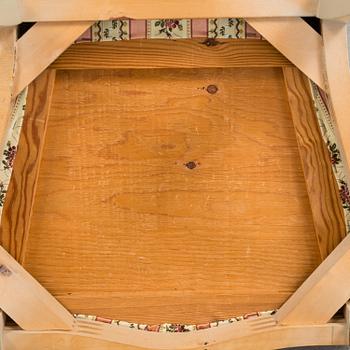 A table and six chairs, second half of the 20th century.