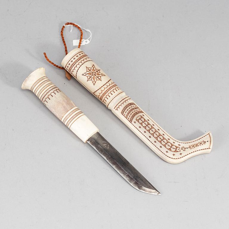 TORE SUNNA, a Sami reindeer horn knife, signed Tore Sunna.