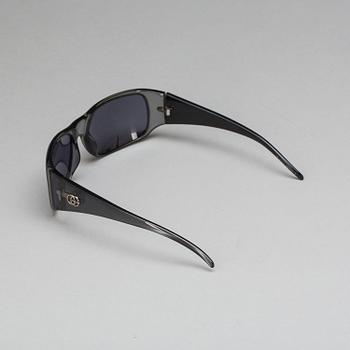 AURINKOLASIT, Gucci.