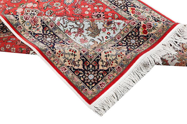 A carpet, Tabriz, part silk, c. 202 x 152 cm.
