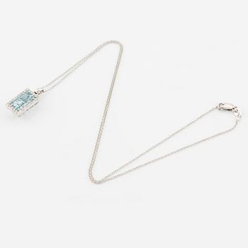 Pendant with chain in 18K gold set with a faceted aquamarine and round brilliant-cut diamonds.