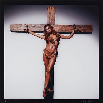 176. Terry O'Neill, "Raquel Welch on the Cross, Los Angeles", 1970.