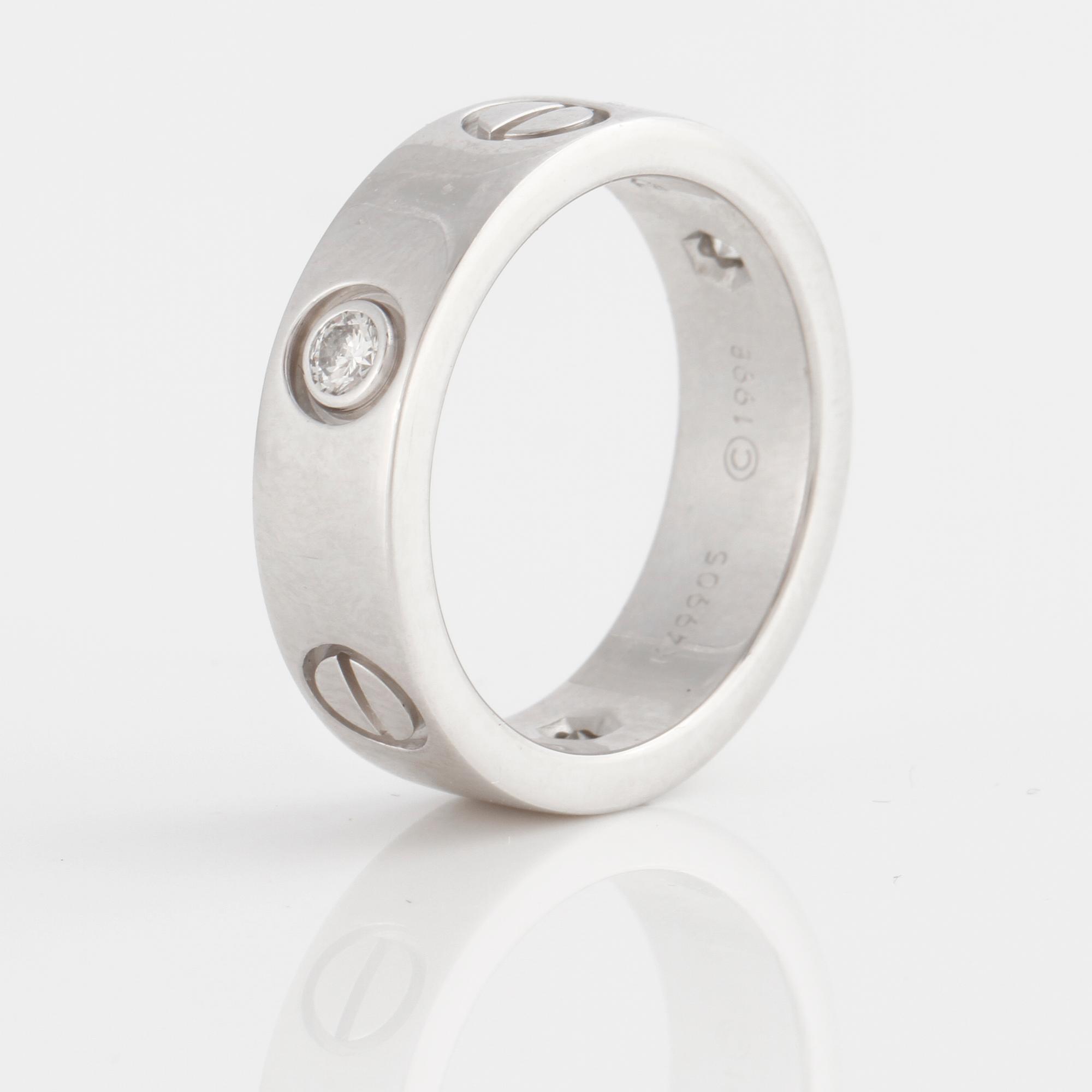 A brilliant-cut diamond "Love" Cartier ring.