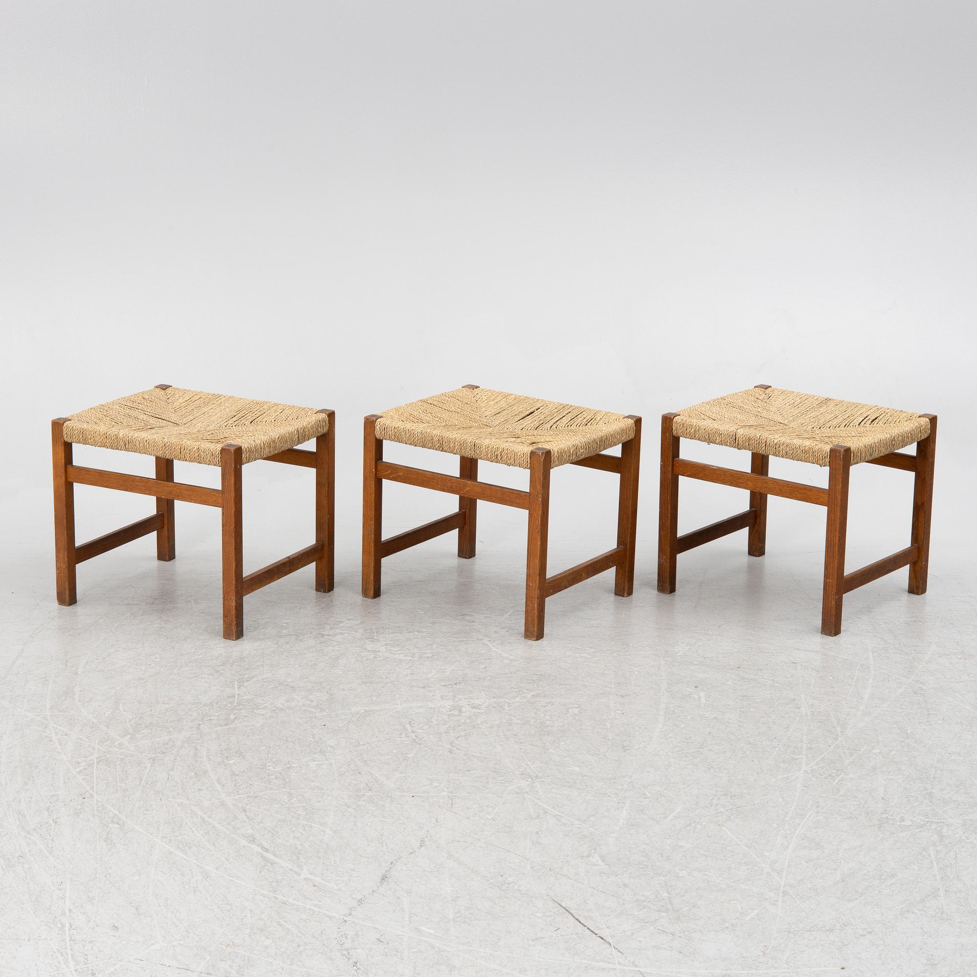 Three oak stools with laced seats, second half of the 20th century.