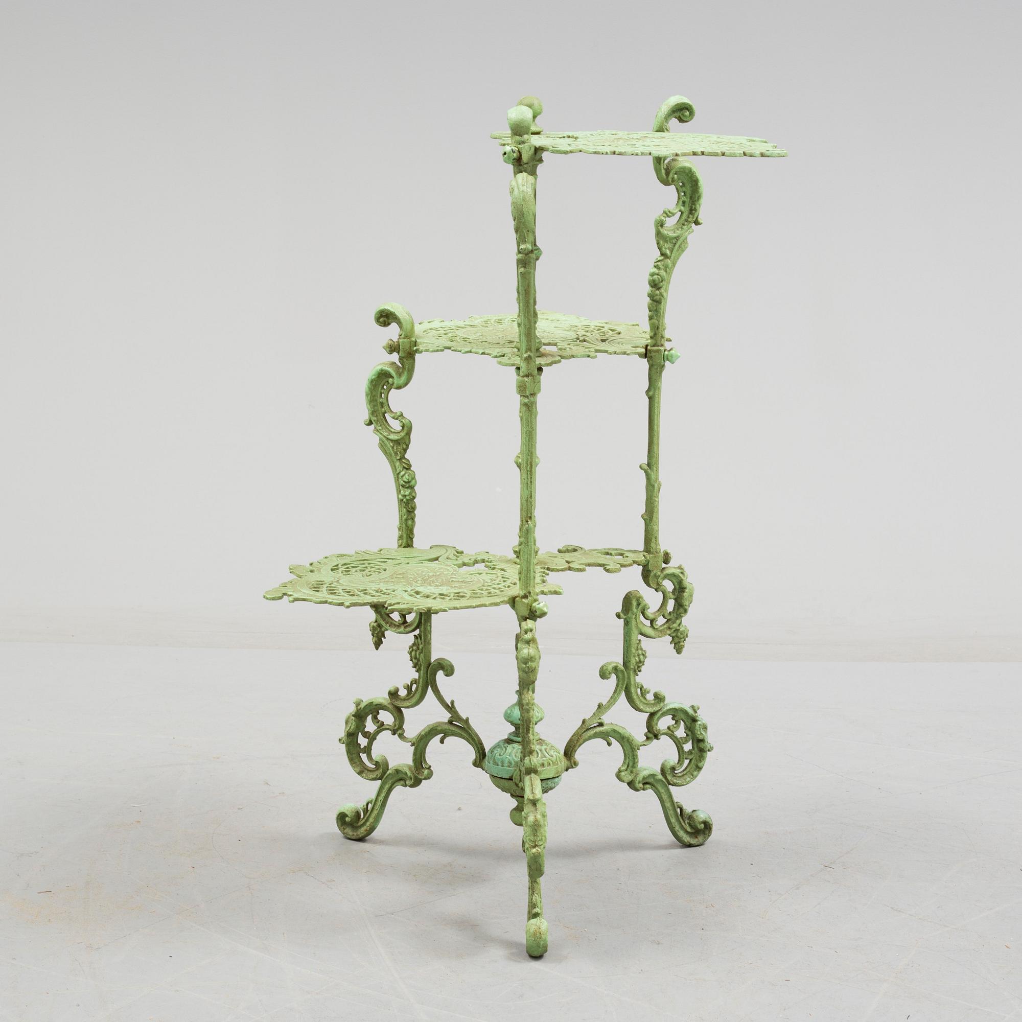 An early 20th century cast iron shelf.