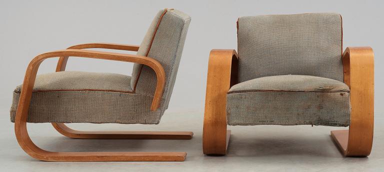 A pair of Alvar Aalto 'no 400' birch armchairs, O.y Huonekalu-ja Rakennustyötehdas A.B for Artek, Finland ca 1939.