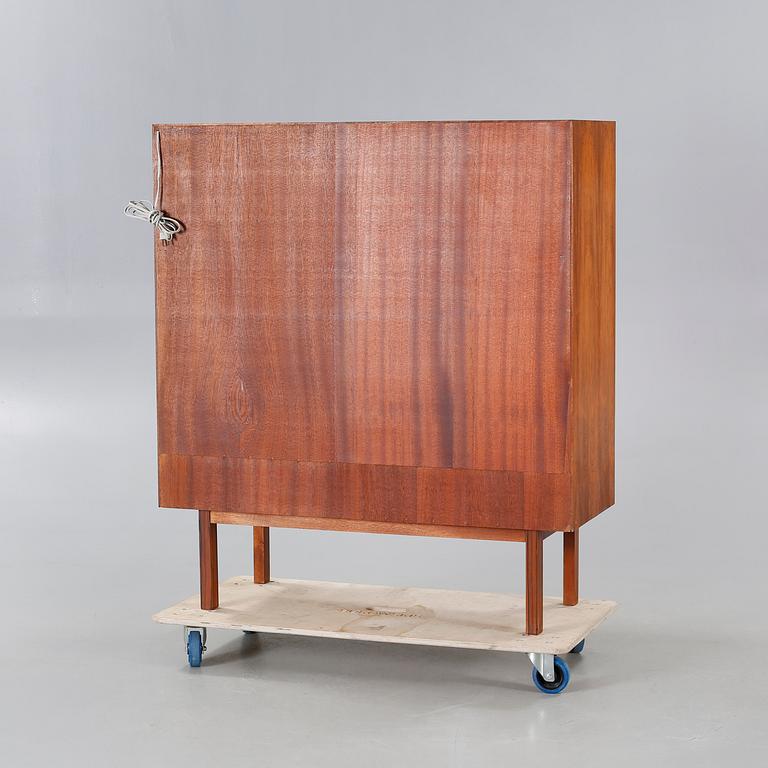 A 1960s drinks cabinet by Axel Christensen, Odder Möbelfabrik, Denmark.