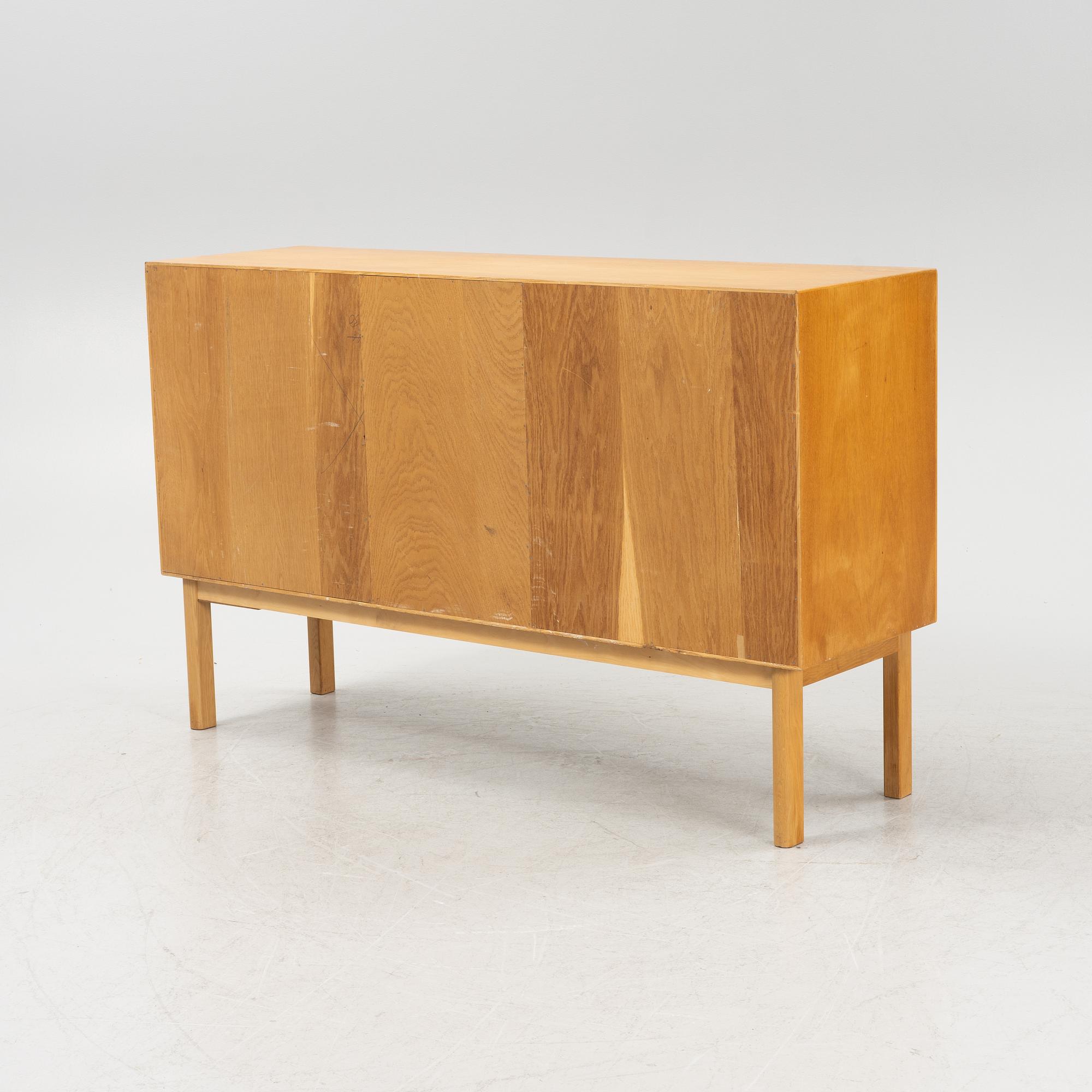 Sven Engström och Gunnar Myrstrand, an oak veneered sideboard, for Bodafors, dated 1962.
