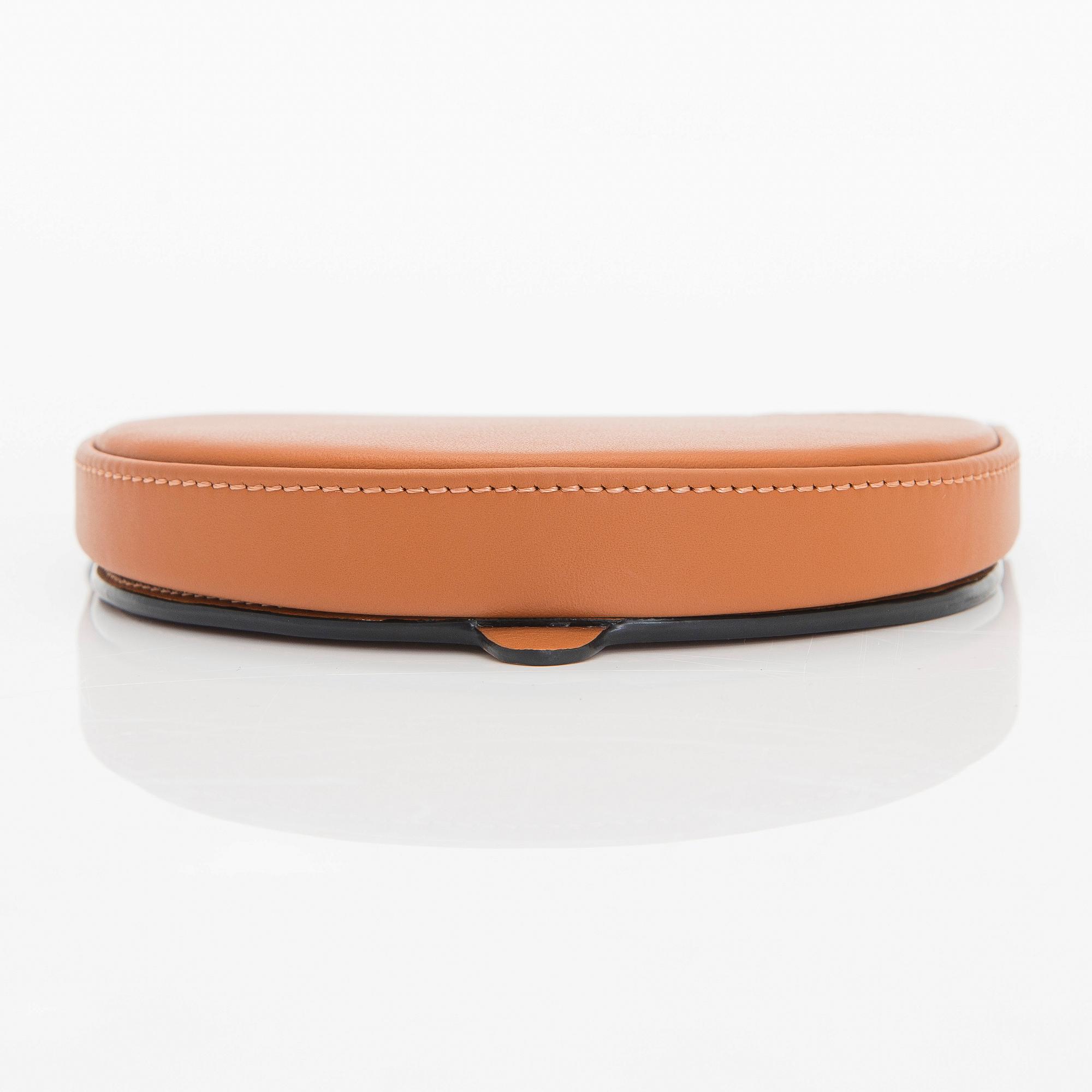 Loewe, a 'Small Heel Pouch' bag.
