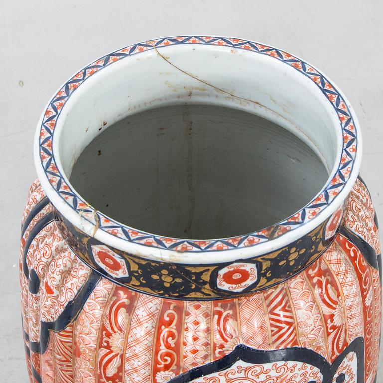 A Japanese porcelain Imari floor urn around  1900.