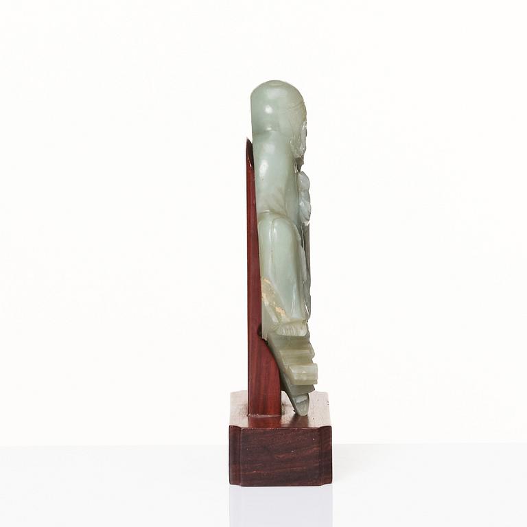 A carved nephrite sculpture of a lohan, Qing dynasty (1664-1912).