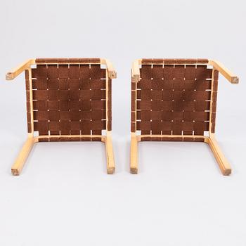 ALVAR AALTO, a pair of mid 20th century 'Y61' stools for Artek. Finland.
