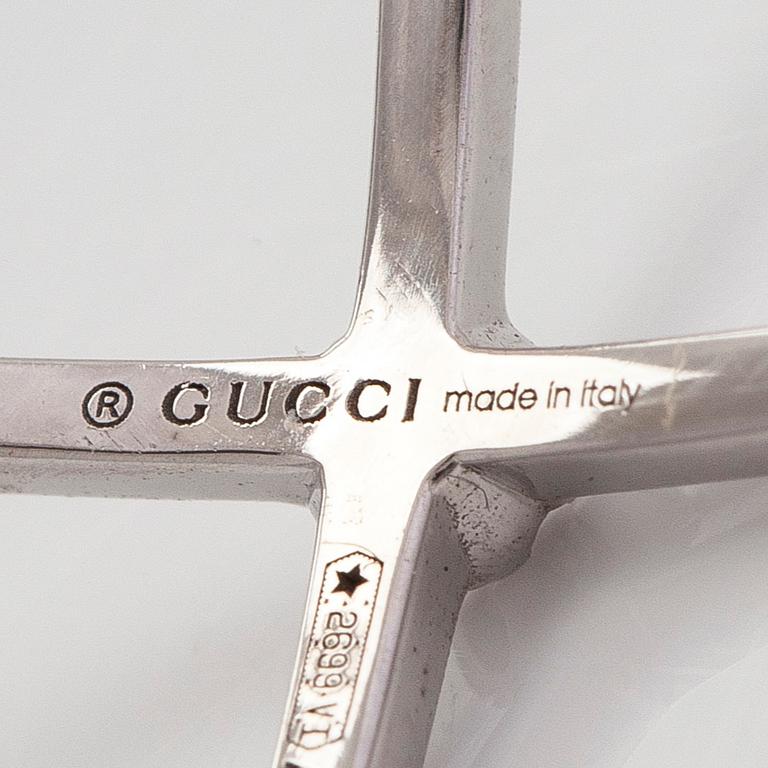 Gucci, sormus, "GG Running" 18K valkokultaa ja timantteja.