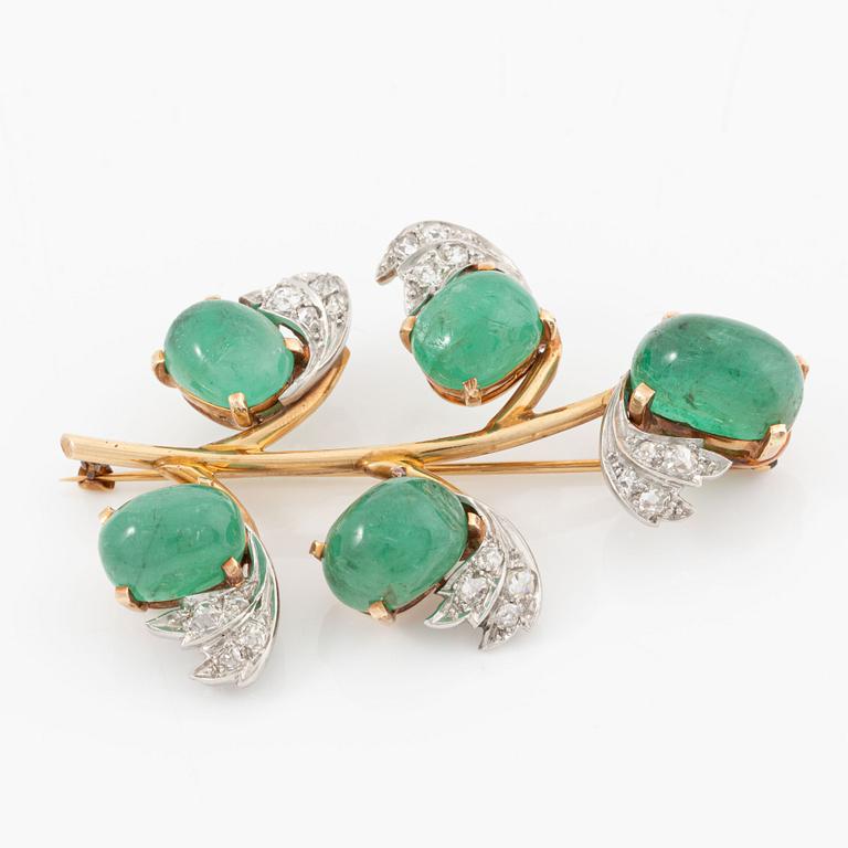 Brooch, 14K gold and platinum set with cabochon-cut emeralds and old-cut diamonds.