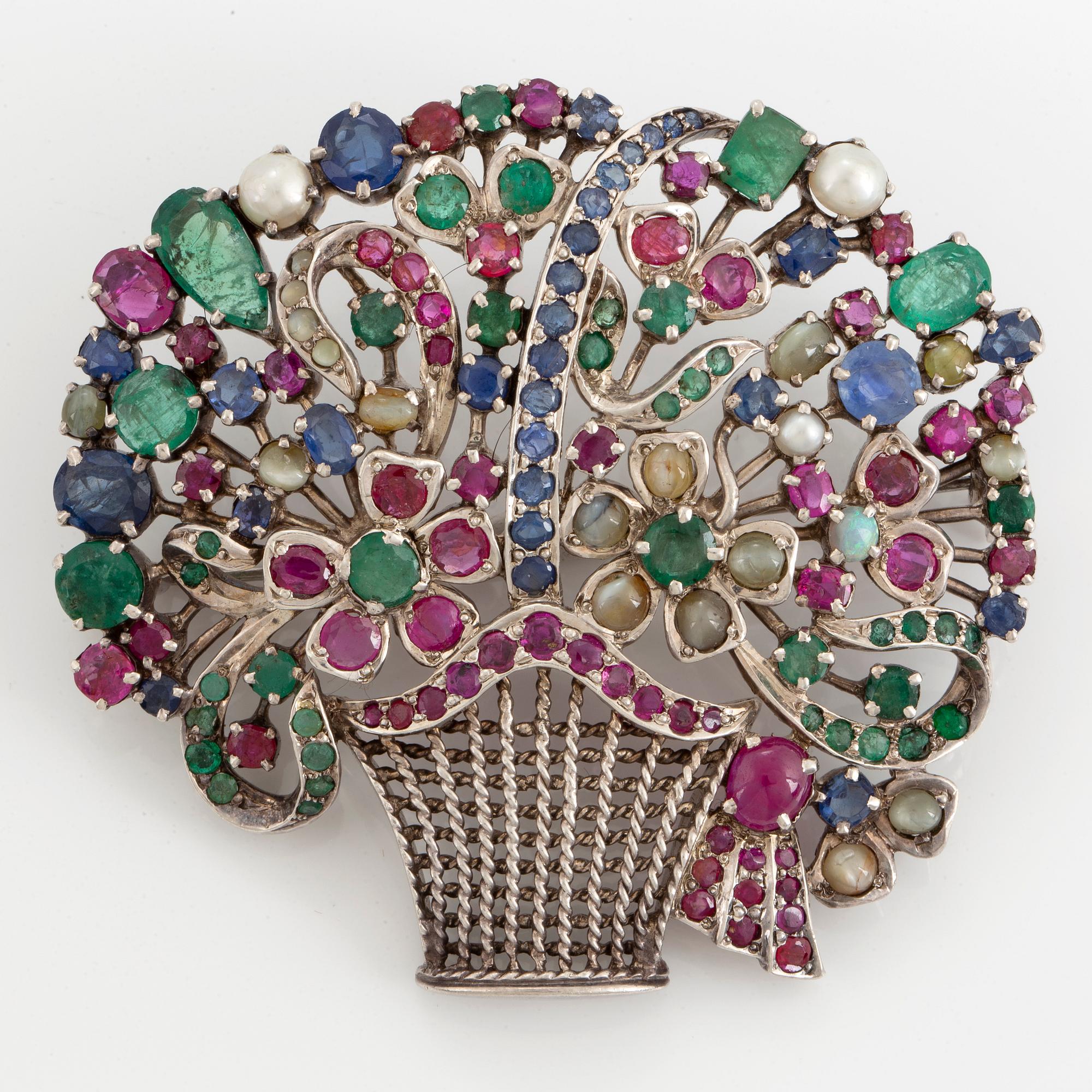 Flower basket brooch, with pearls, rubies, emeralds and sapphire.