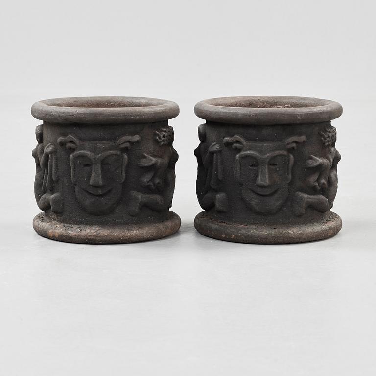 A pair of Anna Petrus cast iron jardinières, Näfveqvarn, Sweden.