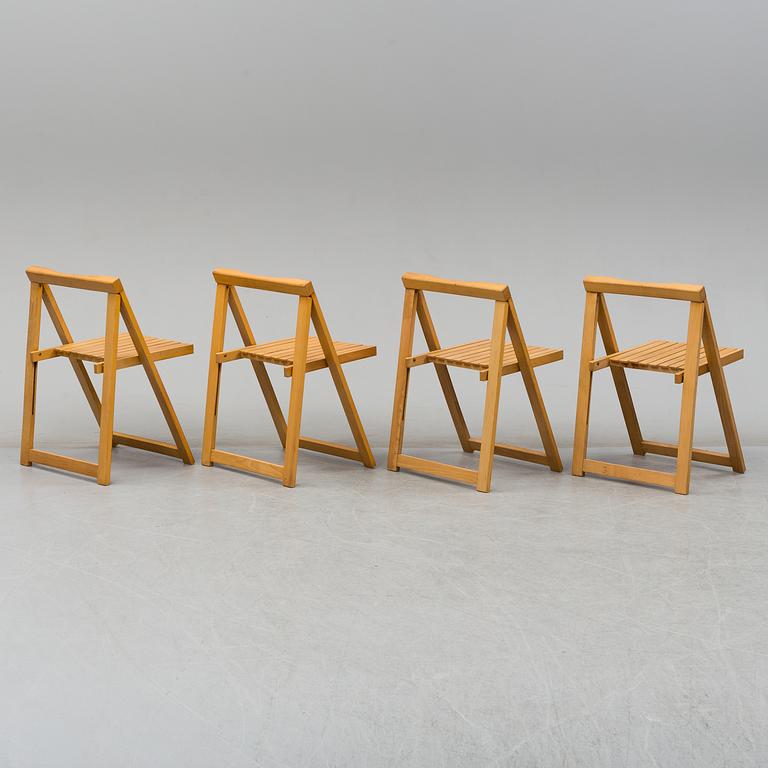 A gateleg table and 4 chairs, late 20th century.