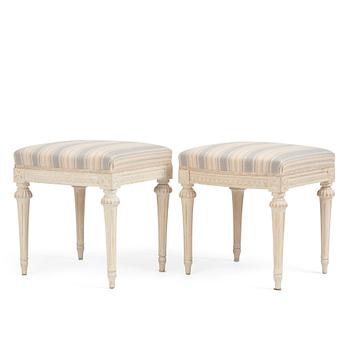 81. A pair of Gustavian stools by E. Öhrmark (master in Stockholm 1777-1813).
