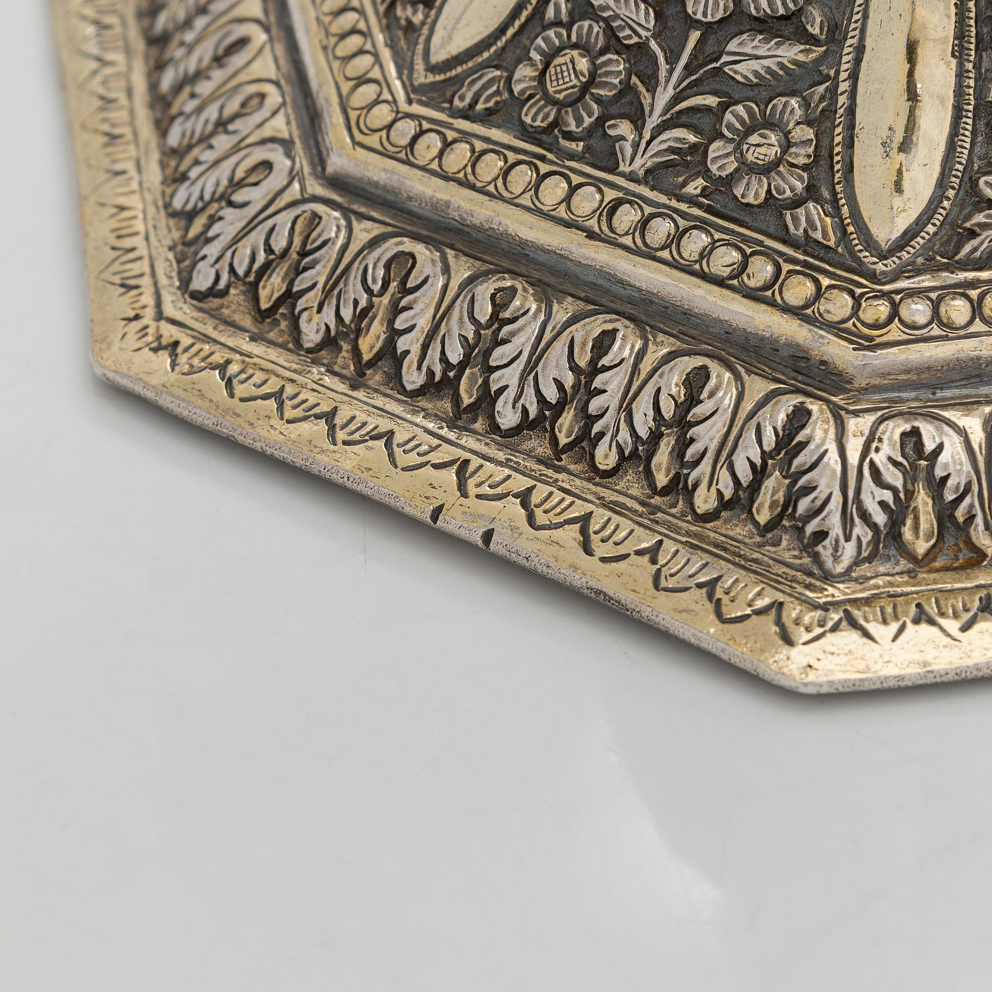 A parcel-gilt silver repoussé water pipe huqqa base, 18th/19th Century.