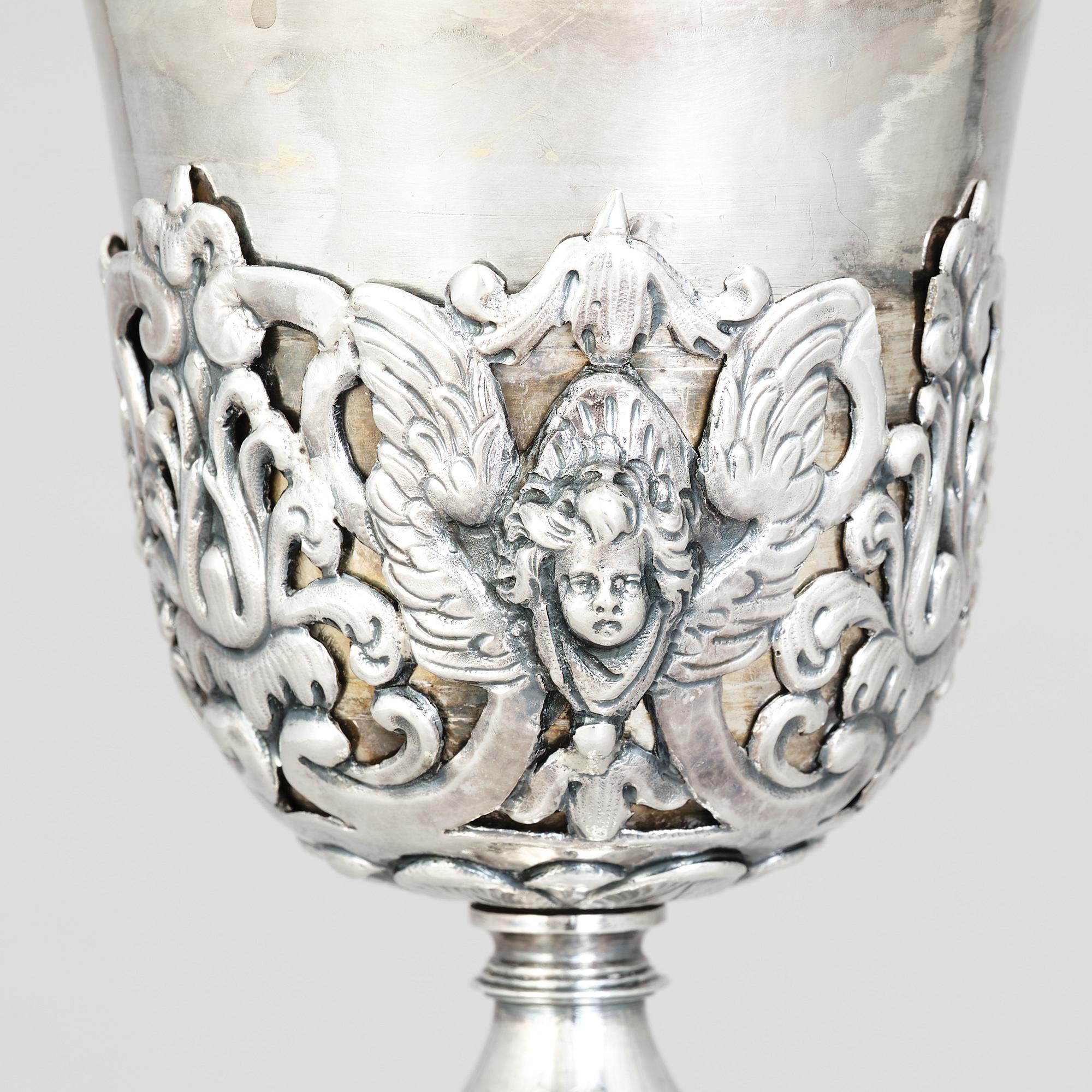 A 19th century parcel-gilt silver cup, unmarked. Renaissance style.