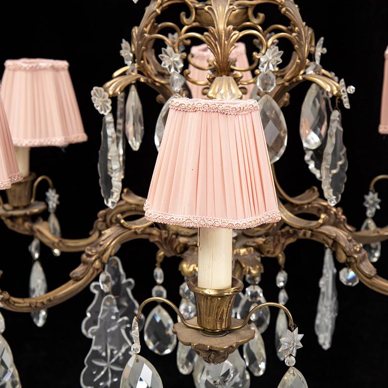 A brass and glass chandelier.