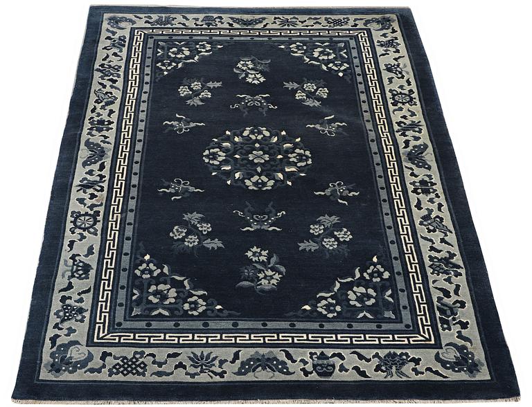 A carpet, China, Antique Finish, ca 250 x 152 cm.