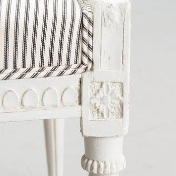 A late 18th century Swedidh Gustavian open arm chair.