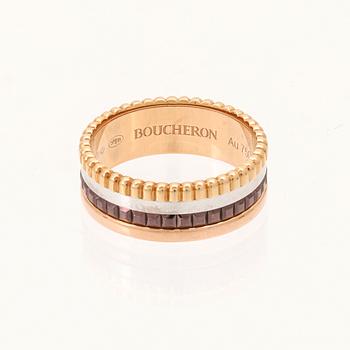 A “Quatre” ring in 18K yellow, pink, white gold and brown PVD by Boucheron.