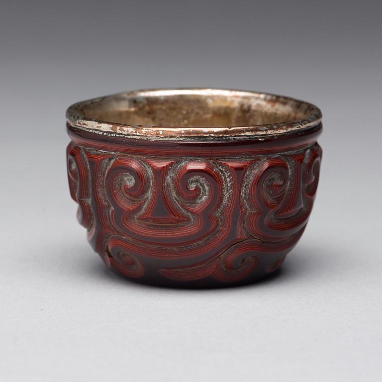 A 'Guri' lacquer silver mounted cup, Qing dynasty, 18th Century or older.