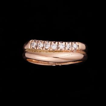 RING, guld 14K, 7 små diamanter, tot. 0,07 ct. Finska stämplar 1998. Vikt 4,1 g.