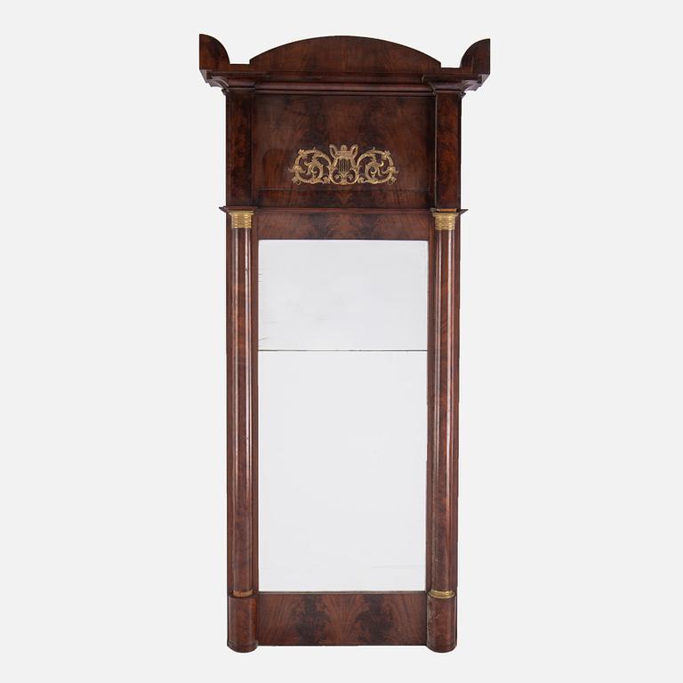 A Swedish Empire mirror and console table, first half of the 19th century.