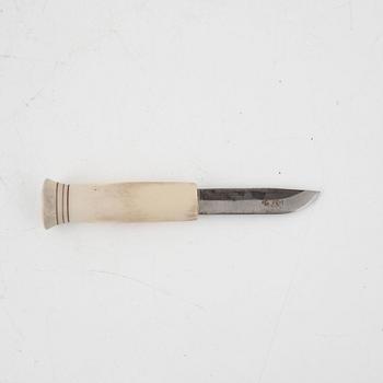 Jon Tomas Utsi, a reindeer horn knife, signed.