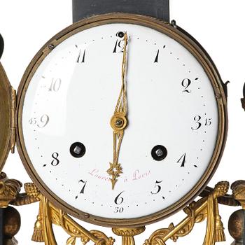 A marble and ormolu Louis XVI portico mantel clock, Paris, late 19th century.