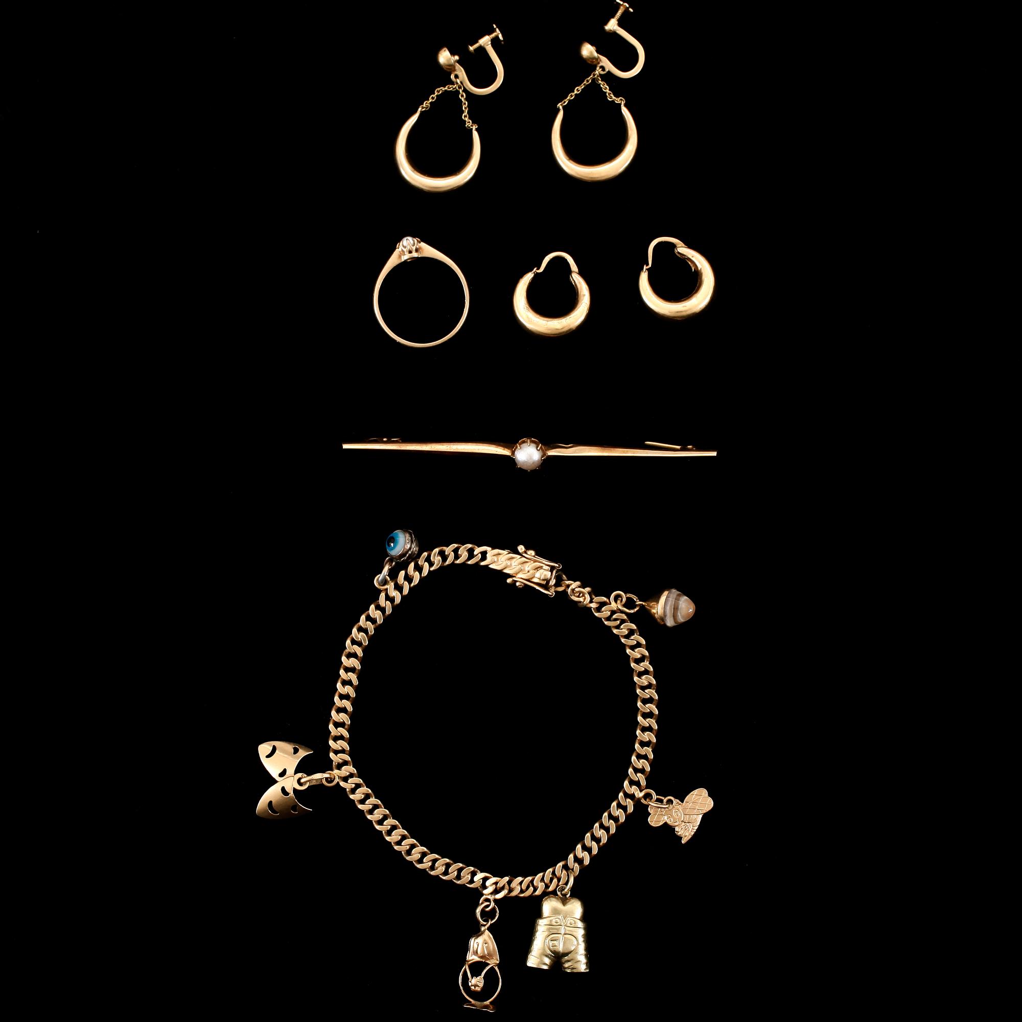 PARTI GULD, 14 samt 18 k guld. Totalvikt ca 23g.