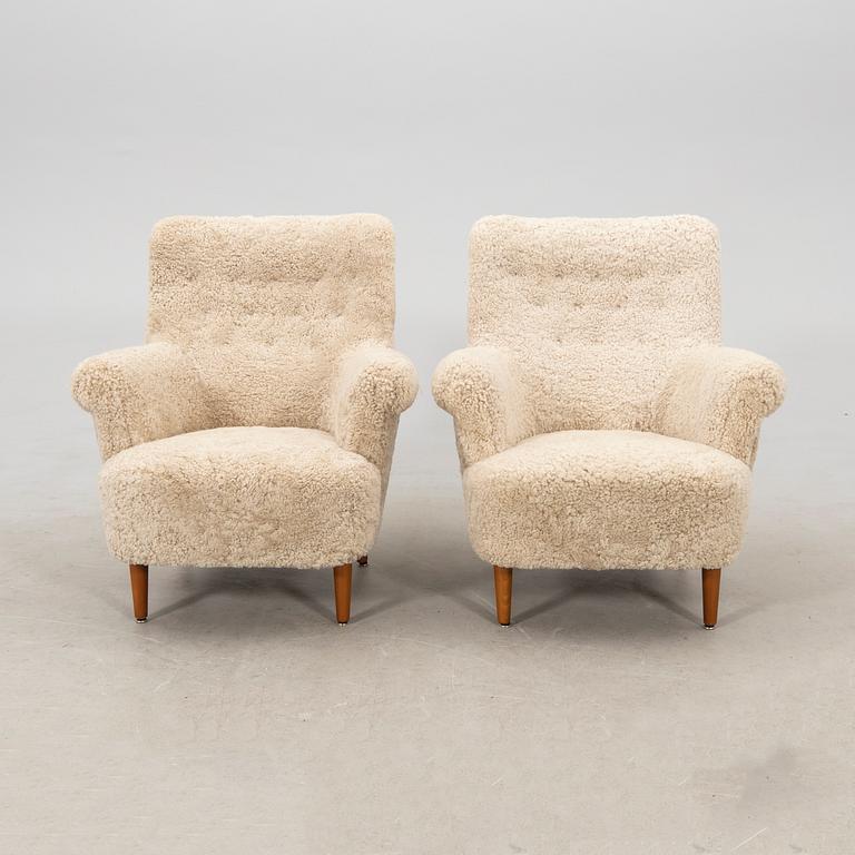 Carl Malmsten, a pair of armchairs "Hemmakväll", second half of the 20th century.