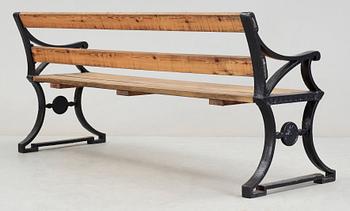 A Folke Bensow cast iron and stained wood park bench, Näfveqvarn.