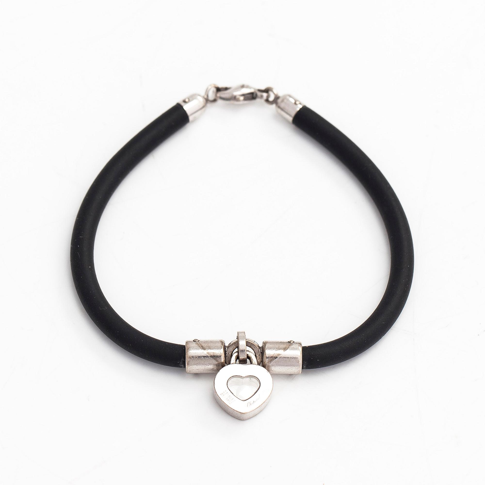 Chopard, armband, "Happy Diamonds", 18K vitguld, gummi och en diamant 0.05 ct.