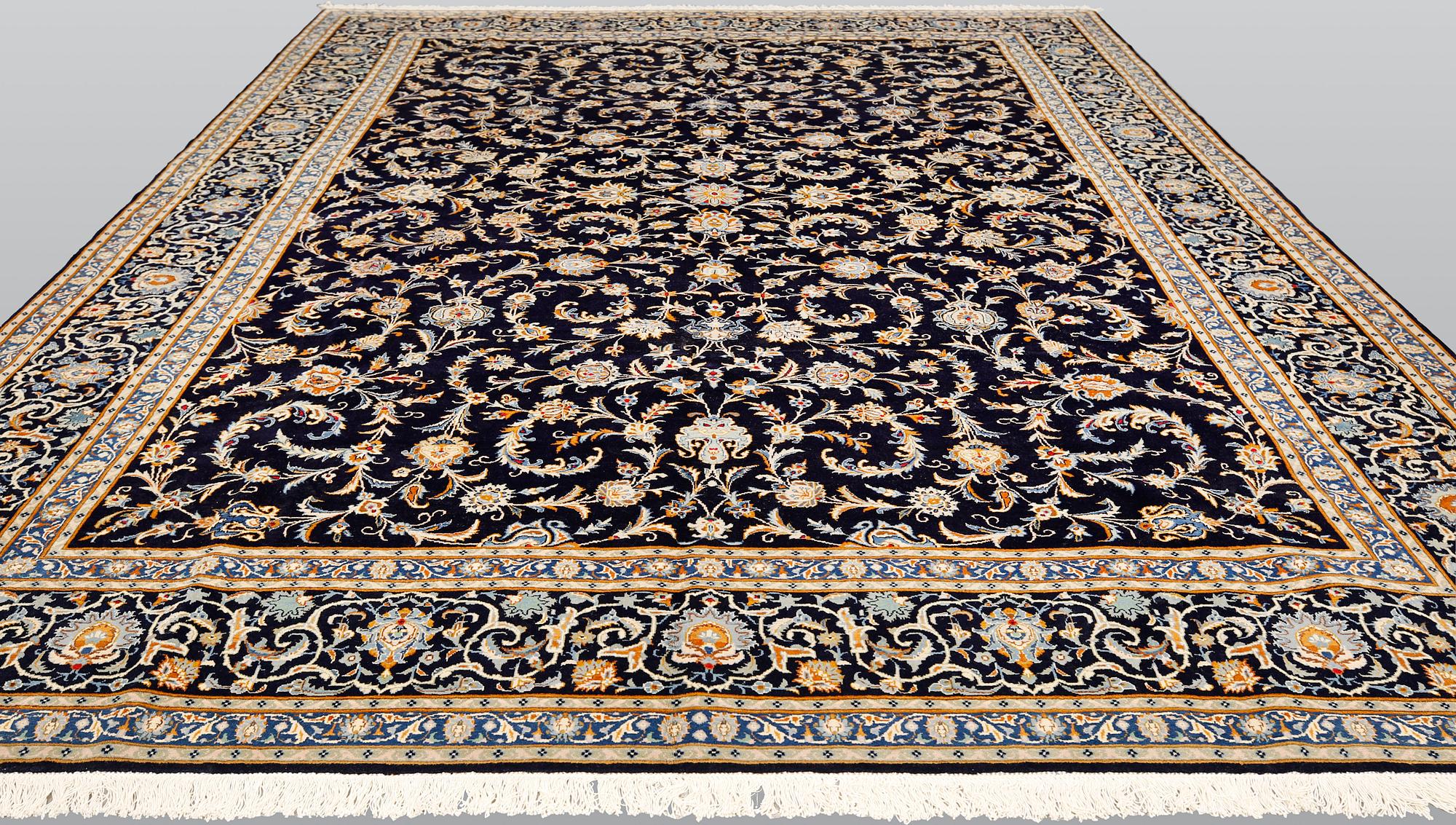 A Keshan carpet, c. 450 x 322 cm.