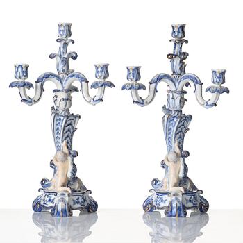 A pair of Royal Copenhagen 'Blå blomst' four-light candelabras, Denmark, 1900-tal.