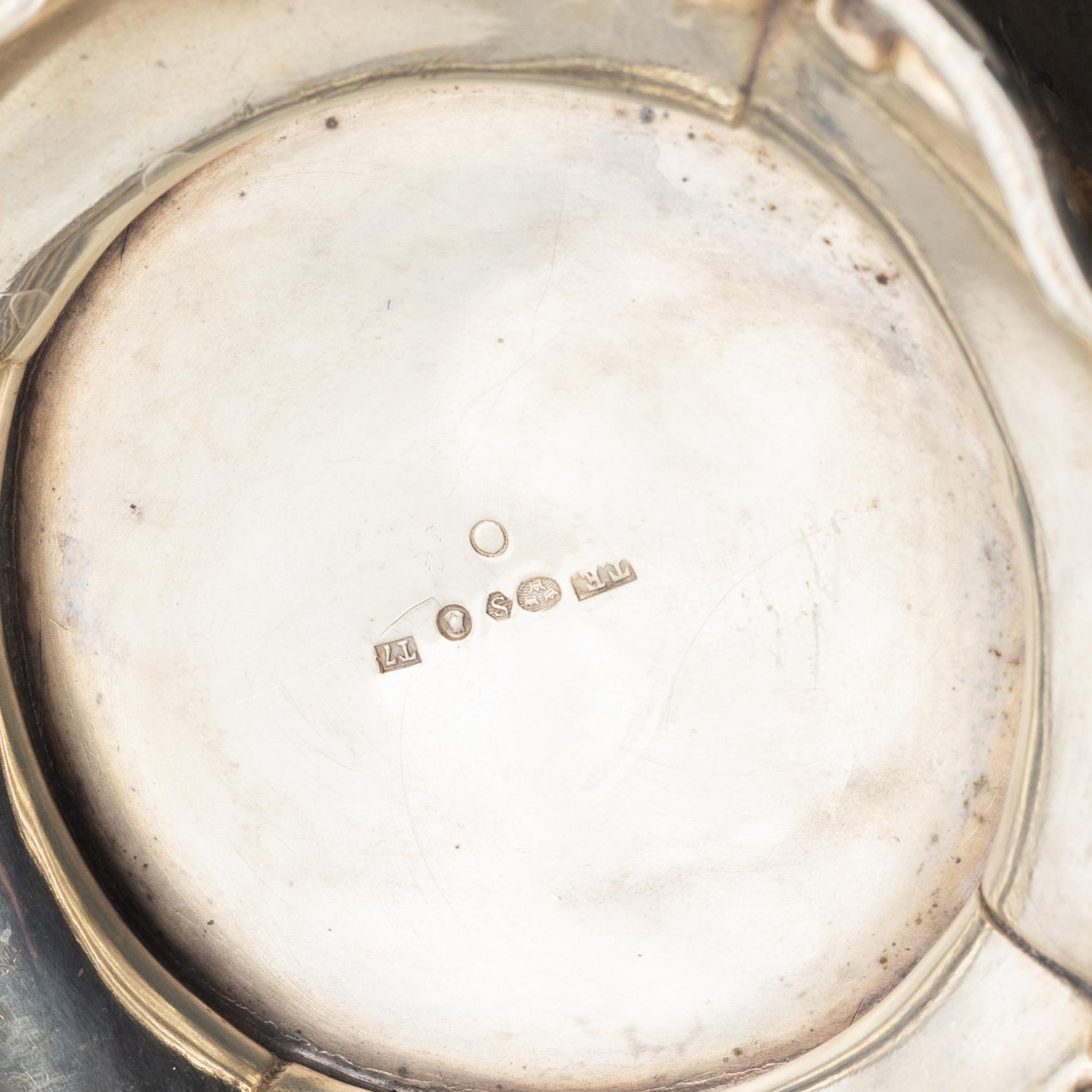 A silver coffee pot, cream jug and sugar bowl, Swedish import marks Torndahl-Ekström, Stockholm 1921.