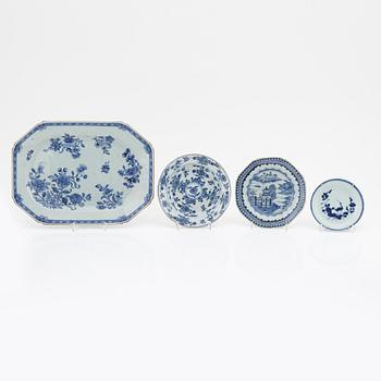 A blue and white serving dish and eight odd plates, Qing dynasty, 18th Century.