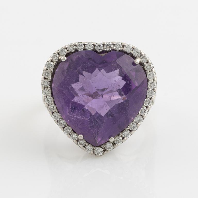 Heart shaped amethyst and brilliant cut diamond ring.